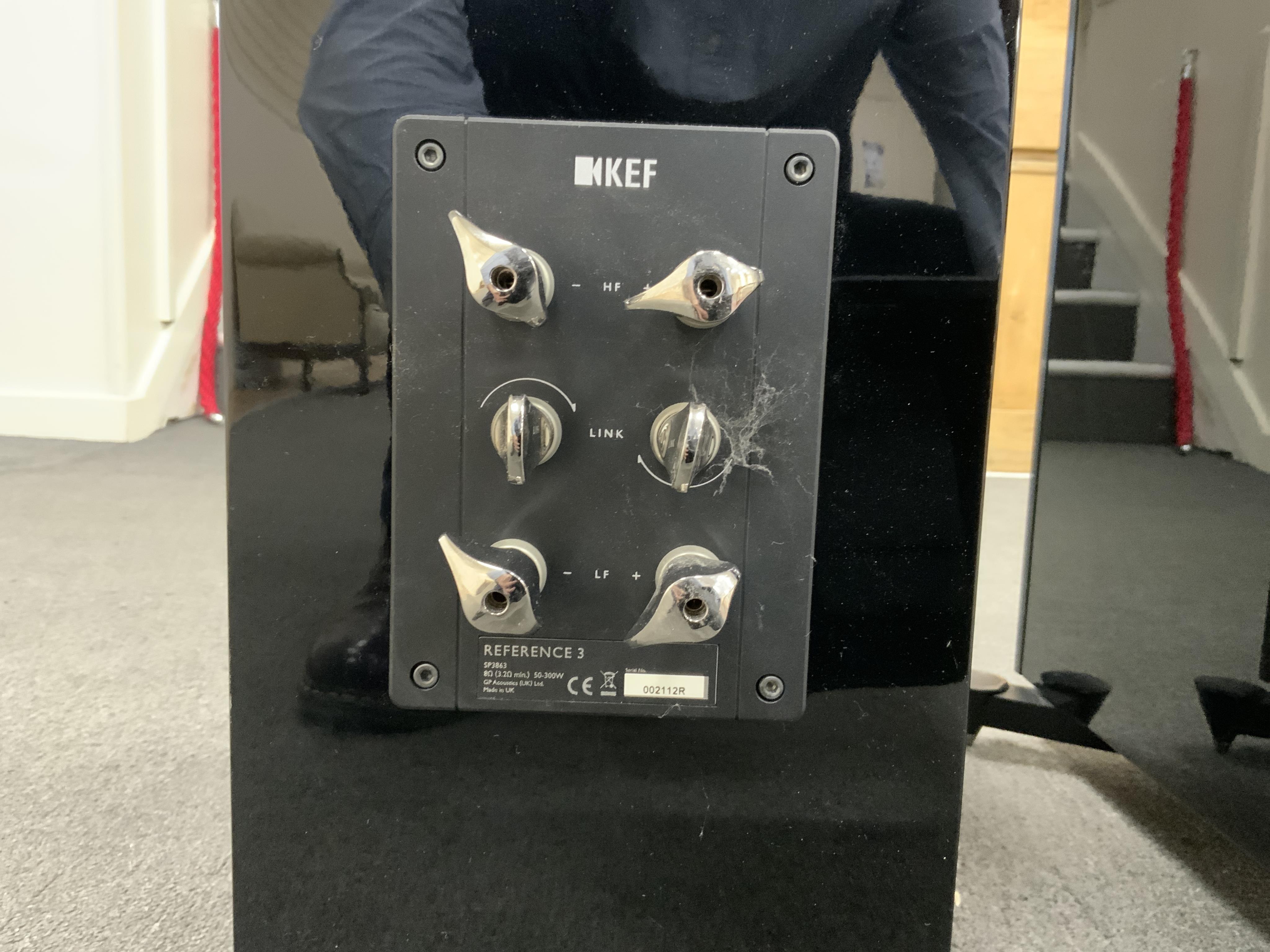 A pair of flooring standing limited edition KEF Reference 3 stereo speakers, the ‘Foundry Edition’, finished in gloss black with copper speaker surrounds on the centre speakers and copper finished plaque to the reverse c